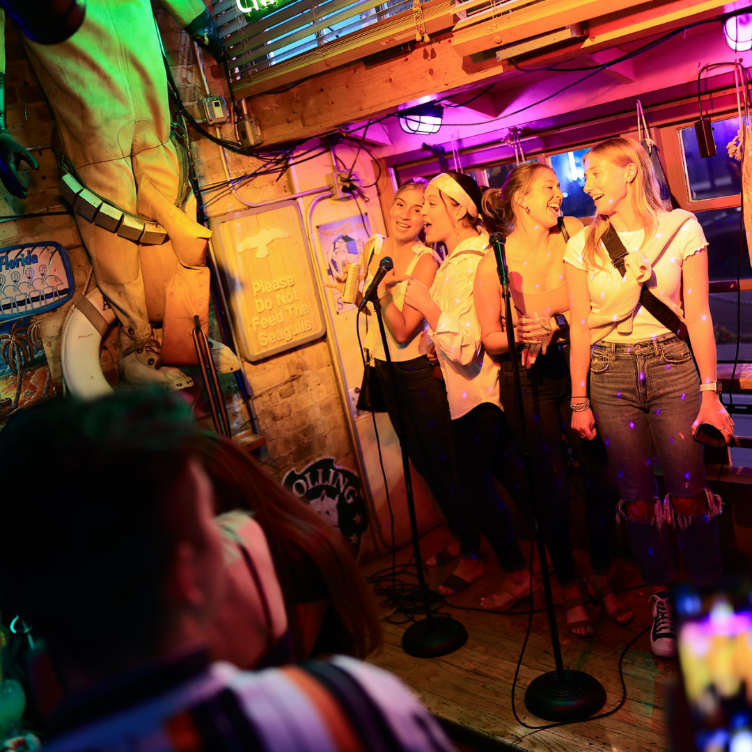 Band performing live on a small stage in a Wrigleyville bar